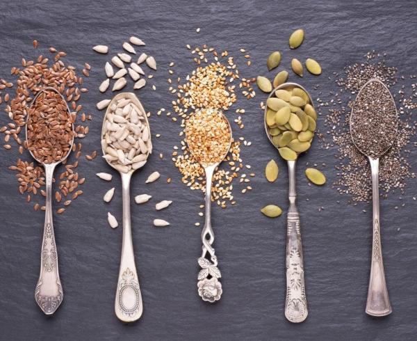 spoons filled with seeds